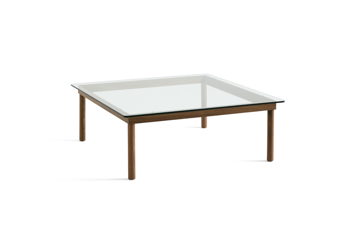 Table basse Kofi 100 x 100 cm, verre clair et piètement en noyer laqué