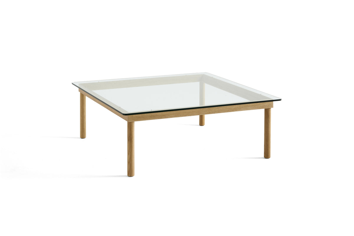 Table basse Kofi 100 x 100 cm, verre clair et piètement en chêne laqué naturel