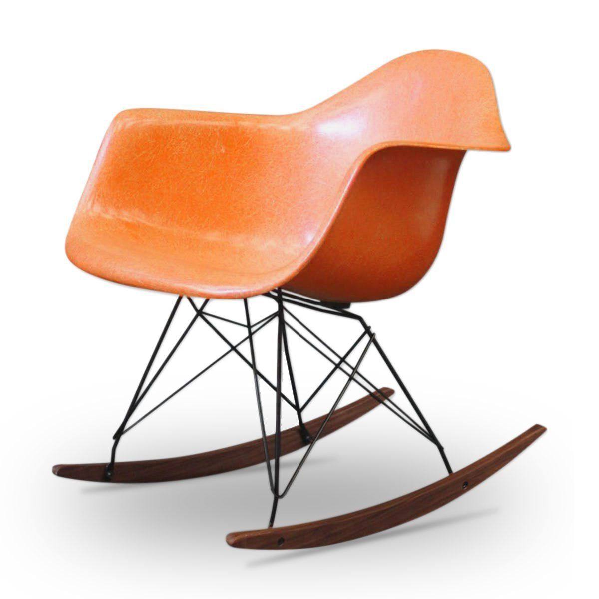 Orange rocking chair by Charles & Ray Eames - Herman Miller