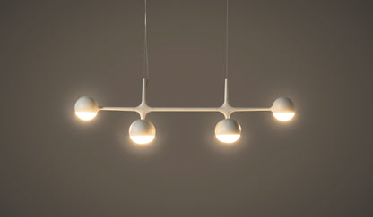 Suspension Dot Pattern Light de Charles et Ray Eames - Cassina-suspension blanche à sphères allumées sur fond sombre-Cassina