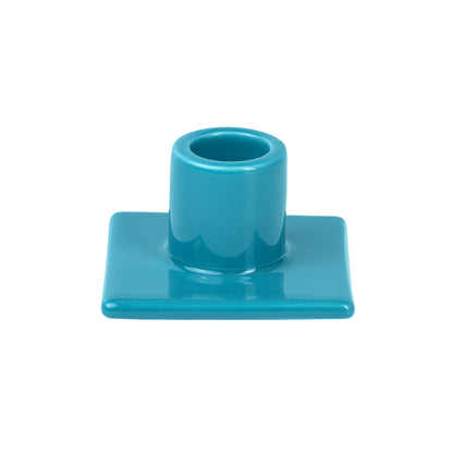 Bougeoir à pied pour bougie bâton bleu de Seletti-bougeoir turquoise à socle carré, vu de face-Seletti