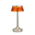 Lampe à poser Bon Jour Unplugged de Philippe Starck - Flos-Chrome noir-Abat-Jour Ambre-The Woods Gallery