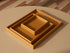 Plateau Arrange grand modèle Montana en situation : les trois tailles de plateaux ARRANGE en Amber
