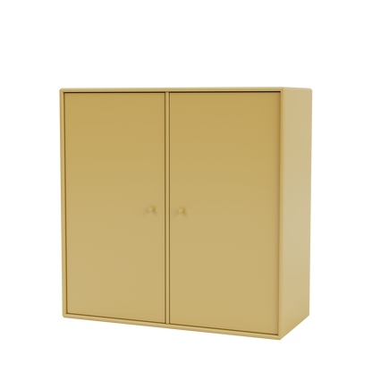 Meuble de rangement Cover Montana, laque 157 Cumin, suspendu au rail mural, vue de trois quarts sur fond blanc