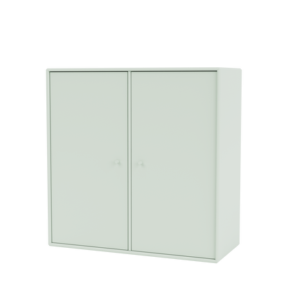 Meuble de rangement Cover Montana, laque 161 Mist, suspendu au rail mural, vue de trois quarts sur fond blanc