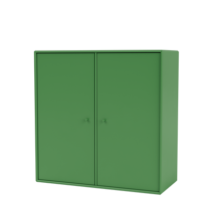 Meuble de rangement Cover Montana, laque 152 Parsley, suspendu au rail mural, vue de trois quarts sur fond blanc