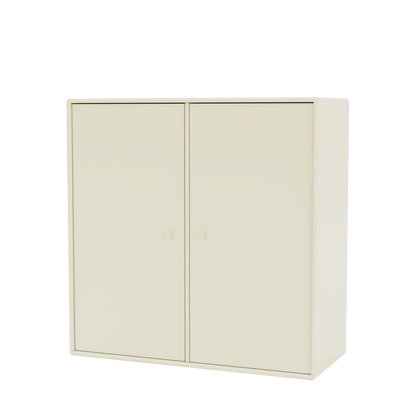Meuble de rangement Cover Montana, laque 150 Vanilla, suspendu au rail mural, vue de trois quarts sur fond blanc