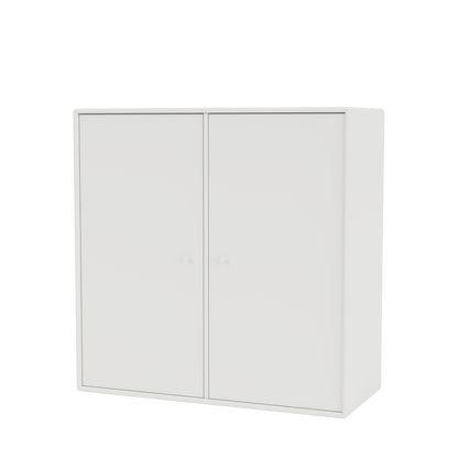 Meuble de rangement Cover Montana, laque 01 White, suspendu au rail mural, vue de trois quarts sur fond blanc