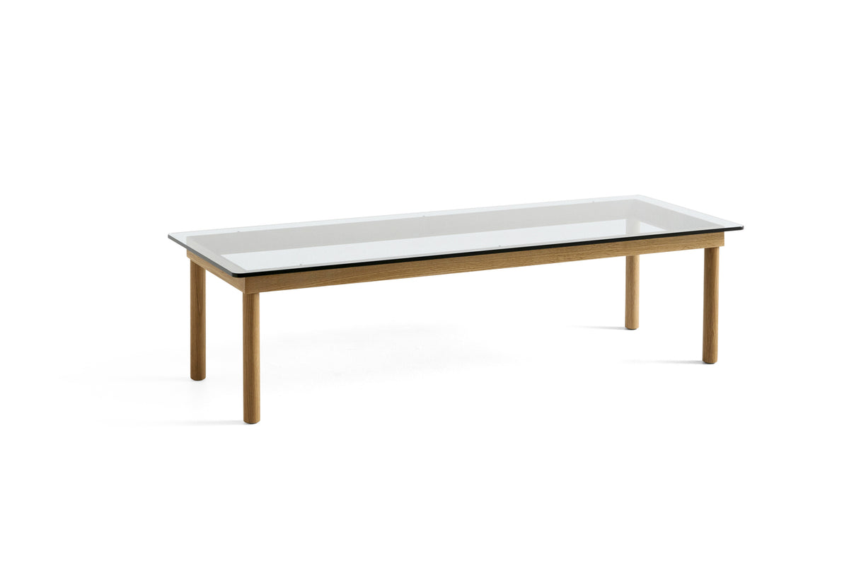 Table basse Kofi 140 x 50 cm, verre clair et piètement en chêne laqué naturel