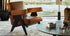 Fauteuil 053 Capitol Complex de Pierre Jeanneret - Cassina-en situation, cuir cognac et pieds noirs-Cassina