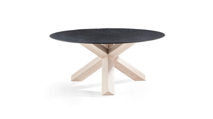 Table La Rotonda de Mario Bellini - Cassina-vue de trois quarts, plateau noir rond et pied croisé clair-Cassina