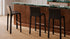 Tabouret de bar Cab 410 de Mario Bellini - Cassina-trois tabourets noirs devant un comptoir en marbre-Cassina