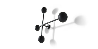 Applique Dot Pattern Light de Charles et Ray Eames - Cassina-vue de face, boules noires sur fond blanc-Cassina