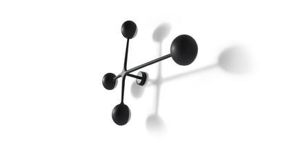 Applique Dot Pattern Light de Charles et Ray Eames - Cassina-vue de face, boules noires sur fond blanc-Cassina